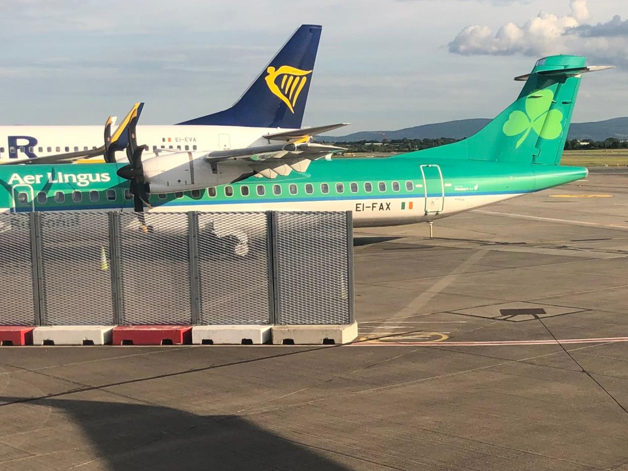 Big rivals: aircraft in the colours of Aer Lingus and Ryanair at Dublin airport (Simon Calder)