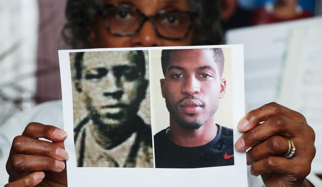 Gladys Johnson Dorsey, 73, shows a composite photograph of her great, great grandfather Oliver Lewis, left, and his great, great, great-grandson Brenin Garcia, 34, to show their resemblance at the home of her sister Ruth Johnson-Watts, 81, in Cincinnati on March 20, 2024. They are all descendants of Lewis, the first jockey to win the Kentucky Derby, in 1875.