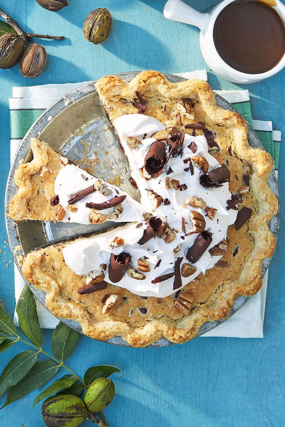 <p>This recipe's homemade pie crust is less daunting with help from your <a href="https://www.amazon.com/Hamilton-Beach-70730-Processor-Vegetable/dp/B008J8MJIQ?tag=syn-yahoo-20&ascsubtag=%5Bartid%7C10050.g.454%5Bsrc%7Cyahoo-us" rel="nofollow noopener" target="_blank" data-ylk="slk:food processor;elm:context_link;itc:0;sec:content-canvas" class="link ">food processor</a>. The light, flaky result serves as the perfect base for the bourbon, chocolate, and pecan mixture.</p><p><strong><a href="https://www.countryliving.com/food-drinks/recipes/a45306/bourbon-pecan-pie-recipe/" rel="nofollow noopener" target="_blank" data-ylk="slk:Get the recipe;elm:context_link;itc:0;sec:content-canvas" class="link ">Get the recipe</a>.</strong></p>