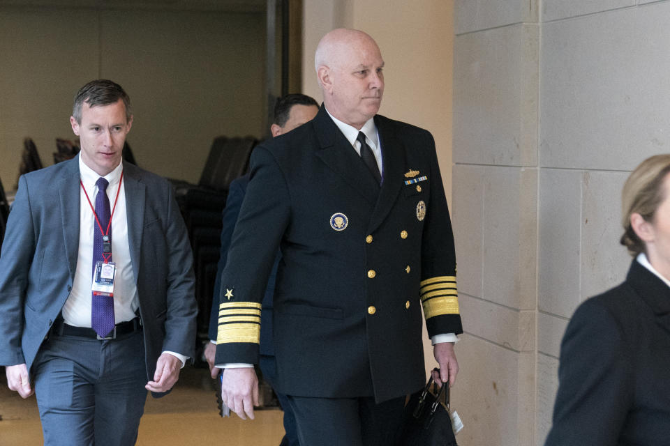 FILE - Vice Chairman of the Joint Chiefs, Adm. Christopher Grady, right, arrives for a closed door briefing about the leaked highly classified military documents, on Capitol Hill, Wednesday, April 19, 2023, in Washington. Navy Adm. Christopher Grady, who currently serves as the military’s No. 2 officer as Joint Chiefs vice chairman, will simultaneously have to fill in as chairman starting Oct. 1 with the retirement of Gen. Mark Milley if his replacement, Air Force Gen. C.Q. Brown, can’t get confirmed in the next two weeks. (AP Photo/Alex Brandon, File)