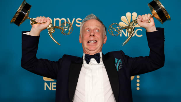 Mike White, winner of Outstanding Directing for a Limited Anthology Series or Movie for "White Lotus" poses with the statuettes that John Oliver says are too dangerous to have around his children.<p>Frazer Harrison/Getty Images</p>