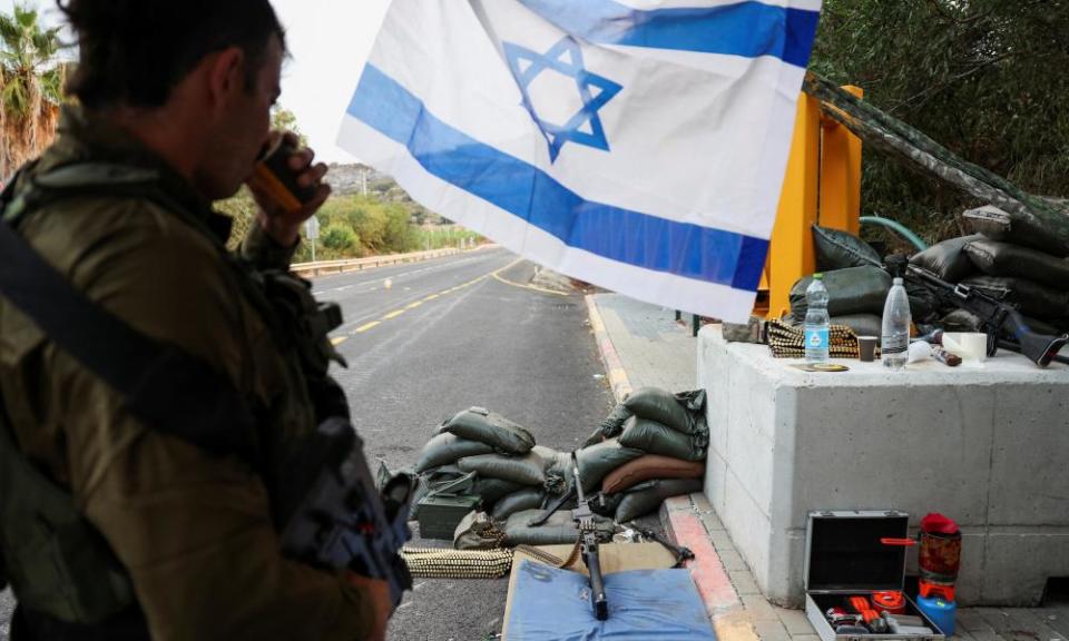Israeli soldiers man a checkpoint near the border with Lebanon.