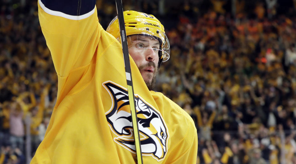 Nashville Predators right wing Craig Smith (15) celebrates after scoring the winning goal against the Dallas Stars in overtime of Game 2 in an NHL hockey first-round playoff series Saturday, April 13, 2019, in Nashville, Tenn. (AP Photo/Mark Humphrey)