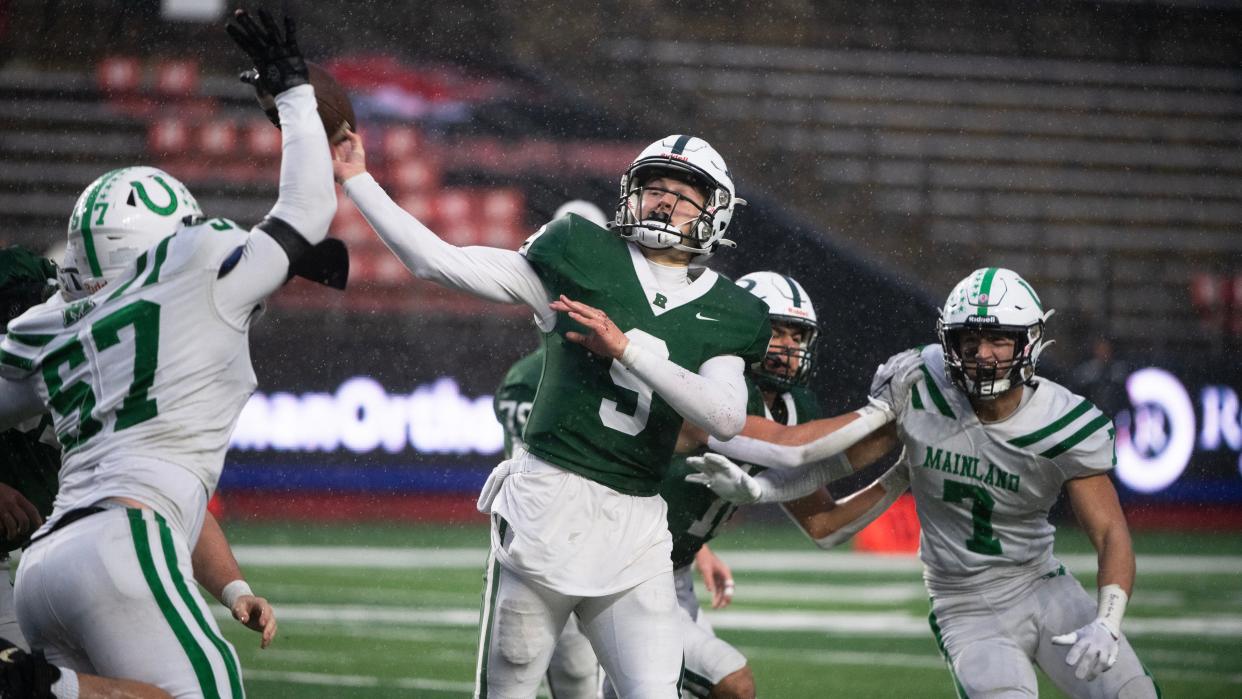 Ramapo's Landon Deprima attempts to throw a pass during the Group 4 state championship football game between Ramapo and Mainland played at Rutgers University in Piscataway on Sunday, November 26, 2023.