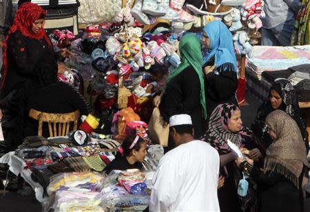 Women shop at Al Ataba, a popular market in downtown Cairo November 11, 2013. REUTERS/Mohamed Abd El-Ghany