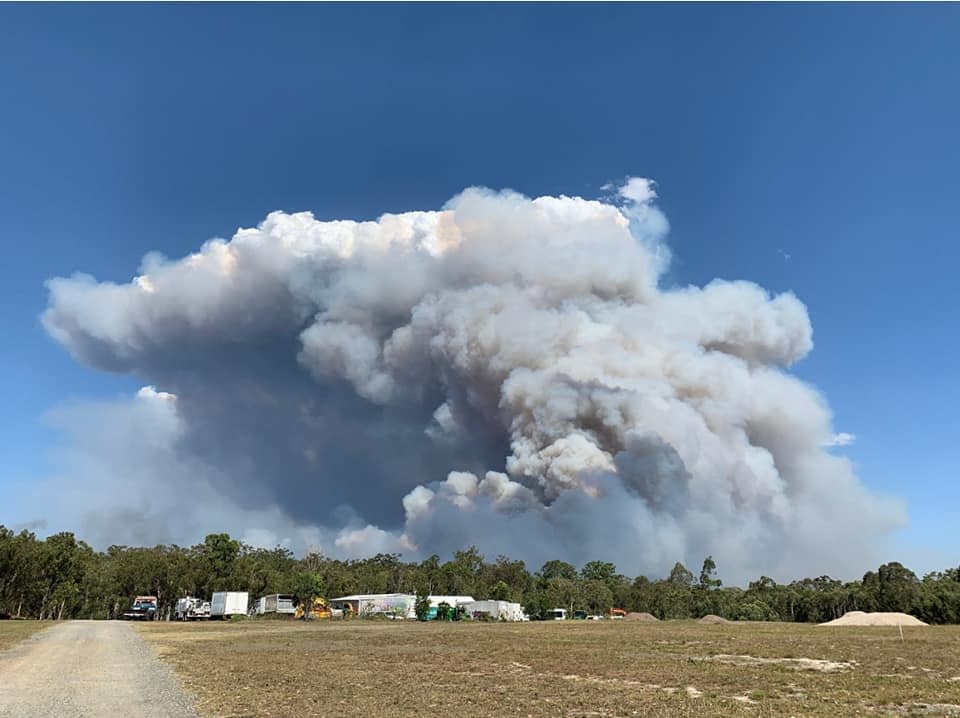 Smoke from Sunshine Coast fires in Queensland as hundreds are forced to evacuate.