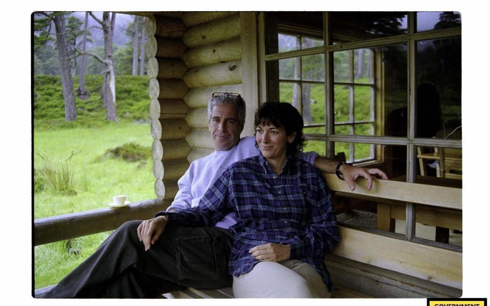 Maxwell and Epstein pictured in the log cabin on the Balmoral Estate where the Queen would spend her time - US Department of Justice /PA