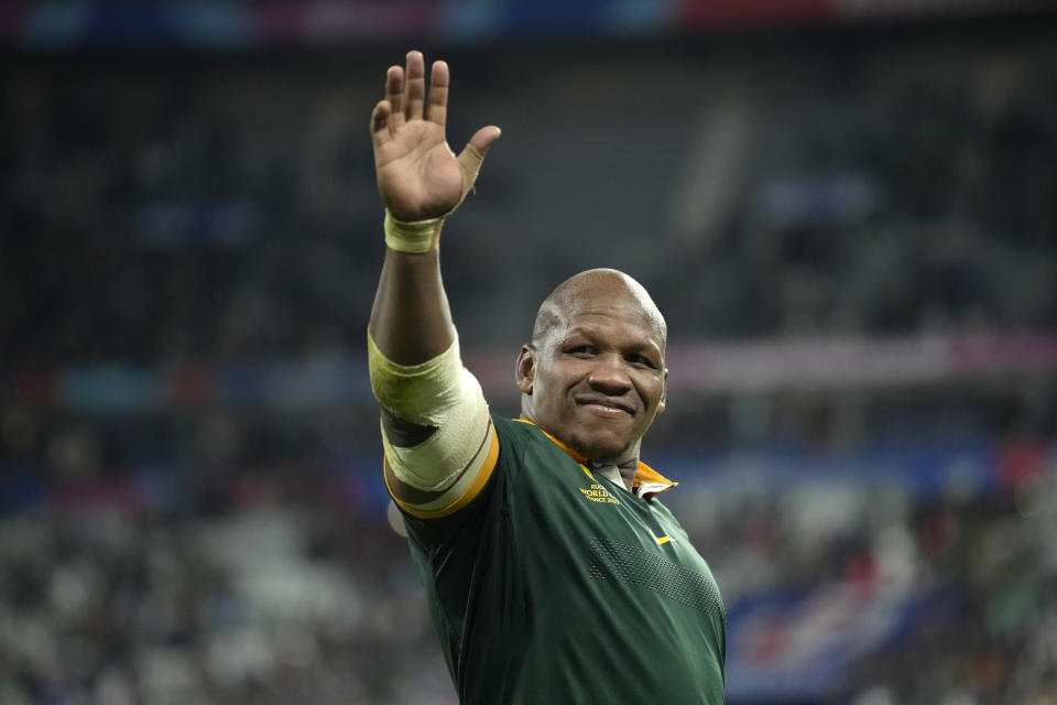 South Africa's Mbongeni Mbonambi waves to the crowd after the end of the Rugby World Cup quarterfinal match between France and South Africa at the Stade de France in Saint-Denis, near Paris Sunday, Oct. 15, 2023. South Africa won the game 29-28. (AP Photo/Christophe Ena)