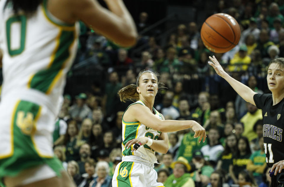 Oregon guard Sabrina Ionescu (20) passes inside against Washington during an NCAA college basketball game in Eugene, Ore., Sunday, March 1, 2020. (AP Photo/Thomas Boyd)