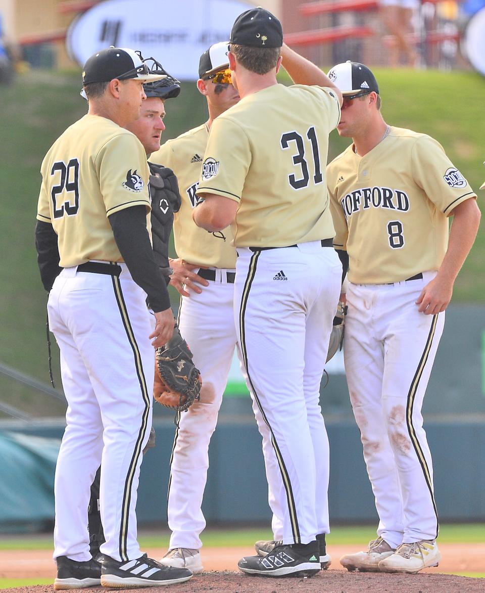 The Southern Conference Baseball Tournament final was held at Greenville's Fluor Field between Wofford and UNC Greensboro on May 29, 2022. Game 2 of the Southern Conference Baseball Tournament final. Wofford's Dalton Rhadans (31) leaves the mound.