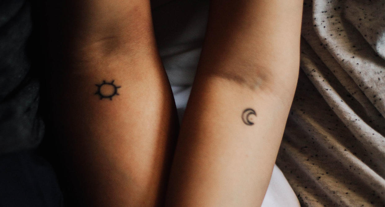 Tiny tattoos are a stylish alternative to a larger artwork. [Photo: Unsplash]