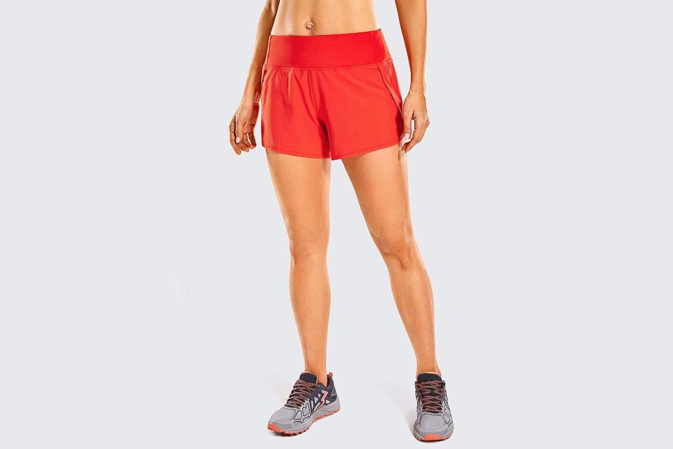 Woman wearing red running shorts