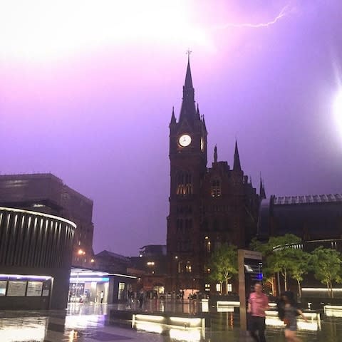  Lightning over Kings Cross in London - Credit: @pamelsaurusrex/PA