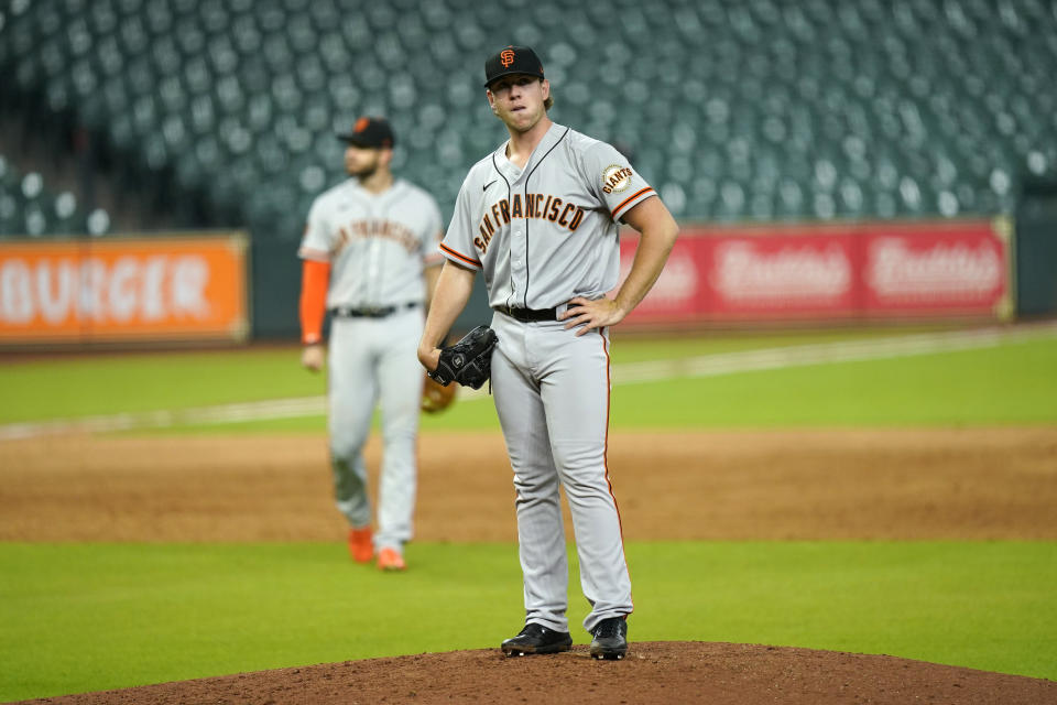 San Francisco Giants' Caleb Baragar waits to be pulled during the sixth inning of a baseball game after giving up a three-run home run to Houston Astros' Martin Maldonado Wednesday, Aug. 12, 2020, in Houston. (AP Photo/David J. Phillip)