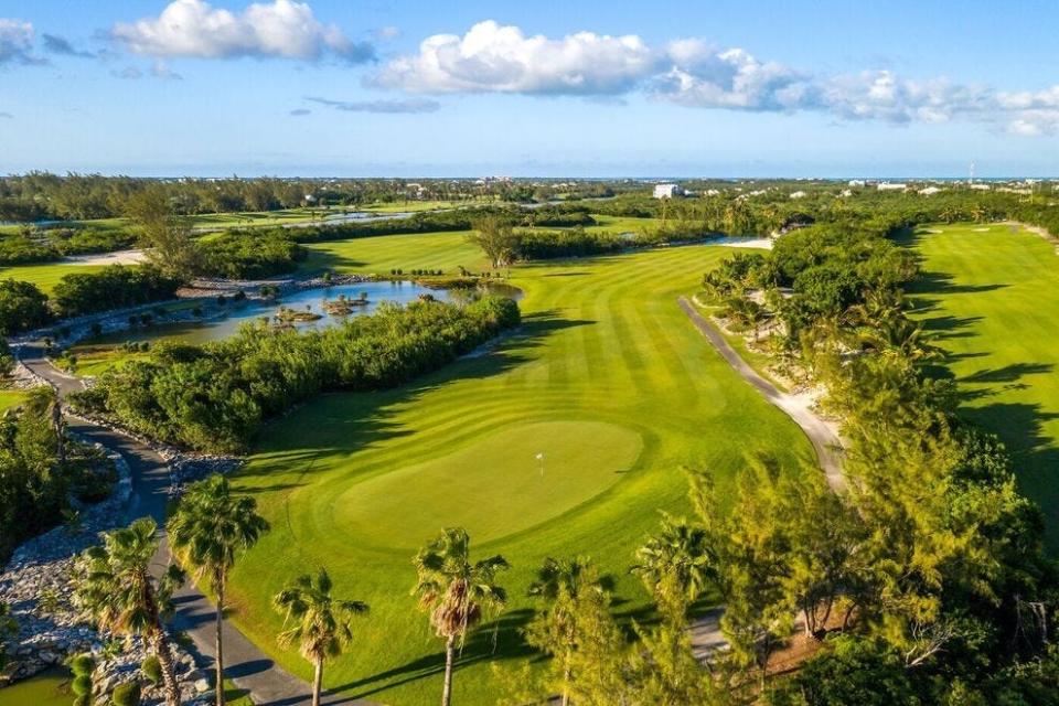 Set up a tropical tee time at Royal Turks and Caicos Golf Club
