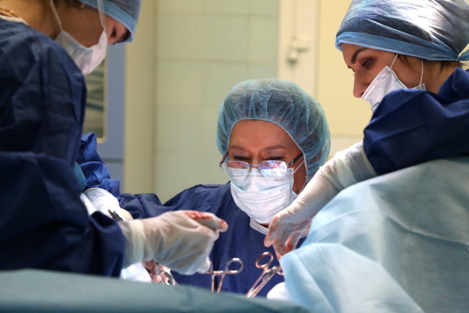 Surgeons during a bowel resection operation. Source: Getty