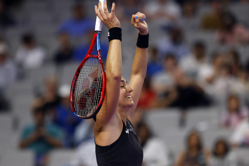 Caroline Garcia, of France, reacts after defeating Maria Sakkari, of Greece, in two sets in the singles semifinals of the WTA Finals tennis tournament in Fort Worth, Texas, Sunday, Nov. 6, 2022. (AP Photo/Ron Jenkins)