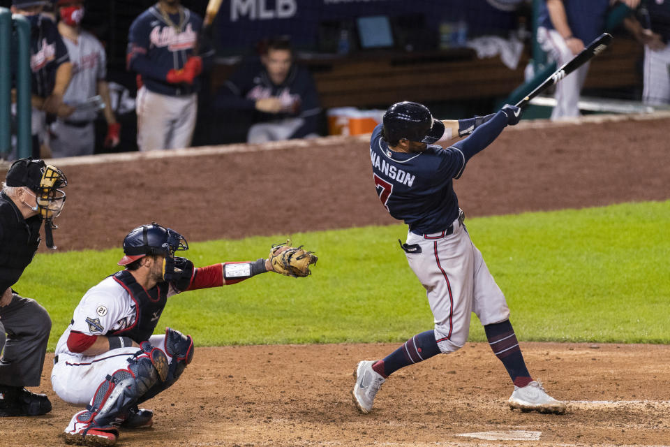 Atlanta Braves' Dansby Swanson hits a home run during the eighth inning of the team's baseball game against the Washington Nationals in Washington, Thursday, Sept. 10, 2020. (AP Photo/Manuel Balce Ceneta)