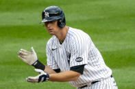 FILE - New York Yankees' DJ LeMahieu celebrates at second base after hitting a two-run double during the sixth inning of a baseball game against the Miami Marlins at Yankee Stadium in New York, in this Saturday, Sept. 26, 2020, file photo. The New York Yankees and AL batting champion DJ LeMahieu worked Friday, Jan. 15, 2021, to put in place a six-year contract worth about $90 million, a person familiar with the deal told The Associated Press. The person spoke on condition of anonymity because the agreement is subject to a successful physical. (AP Photo/Corey Sipkin, File)