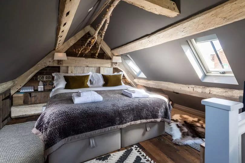 The rustic loft bedroom -Credit:Cheshire Boutique Barns