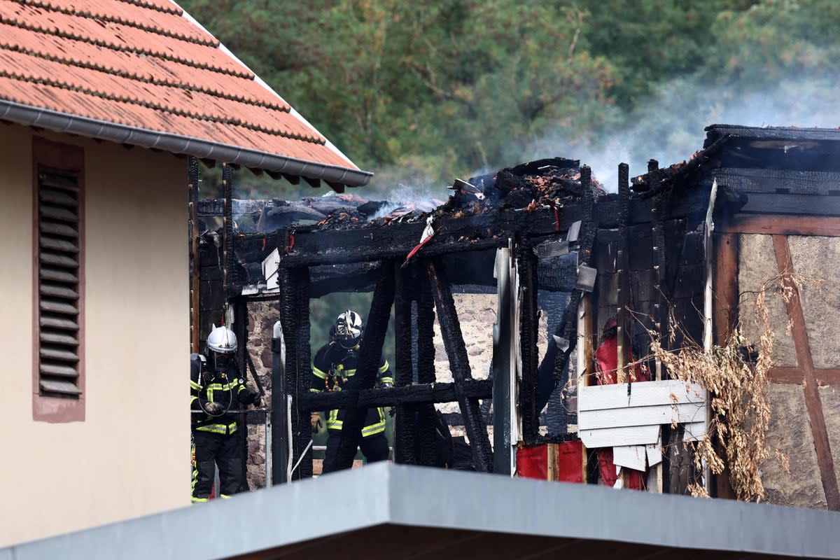 A total of 76 firefighters, four fire engines and four ambulances were deployed to contain the blaze (AFP via Getty Images)