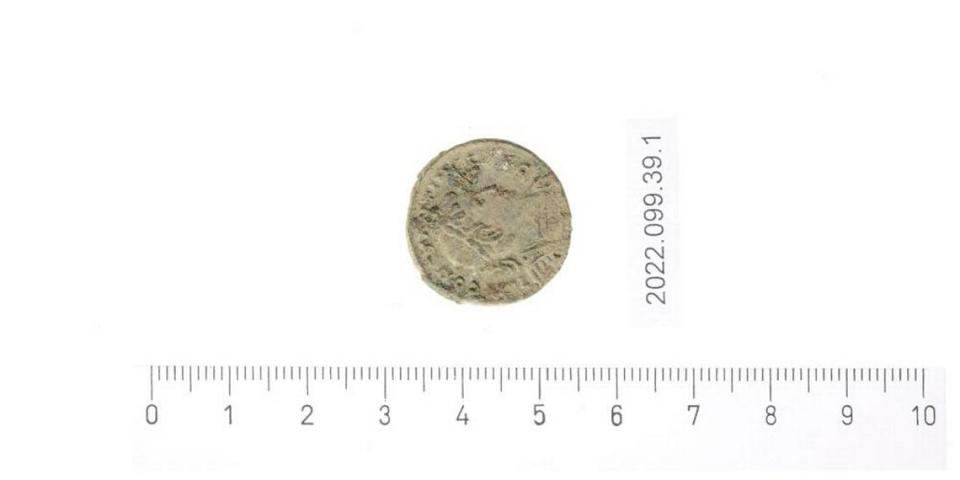 An ancient Roman coin that was discovered at the site.