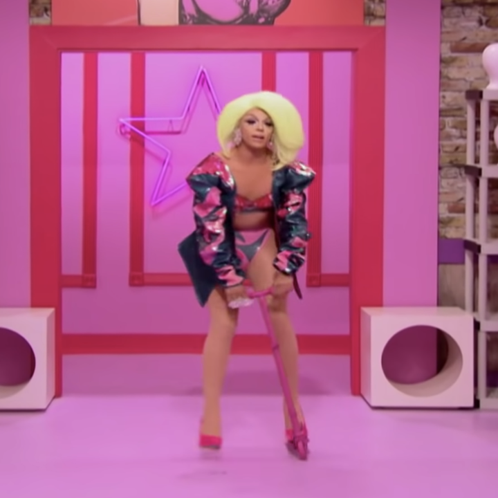 Aja enters the Werk Room on a scooter