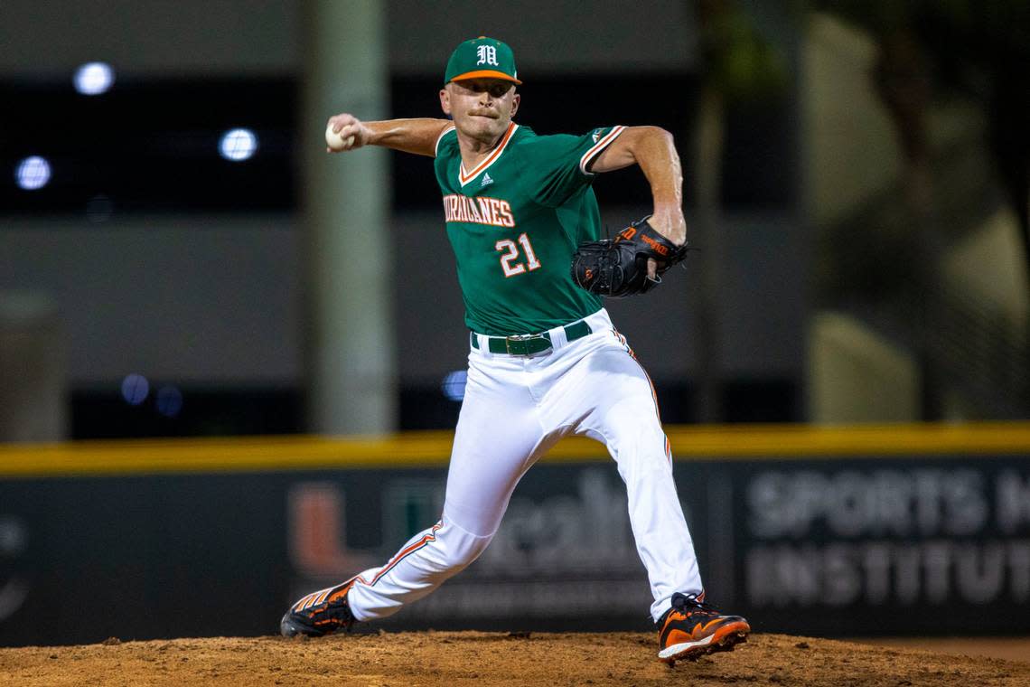 University of Miami pitcher Andrew Walters (21) throws the ball during the ninth inning of an NCAA baseball game against Towson University inside Alex Rodriguez Park at Mark Light Field in Coral Gables, Florida, on Friday, February 18, 2022. Daniel A. Varela/dvarela@miamiherald.com