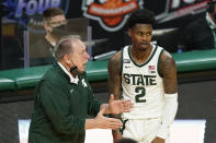 Michigan State head coach Tom Izzo talks with guard Rocket Watts (2) during the second half of an NCAA college basketball game against Illinois, Tuesday, Feb. 23, 2021, in East Lansing, Mich. (AP Photo/Carlos Osorio)