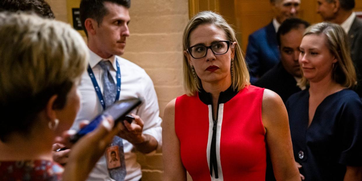 U.S. Sen. Kirsten Sinema (D-AZ) heads back to a bipartisan meeting on infrastructure in the basement of the U.S. Capitol building after the original talks fell through with the White House on June 8, 2021 in Washington, DC.