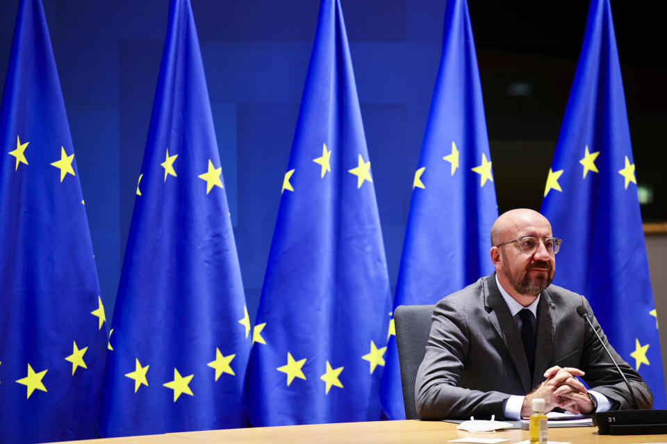 FILE - In this file photo dated Thursday, Nov. 19, 2020, European Council President Charles Michel talks with EU leaders during an EU Summit video conference to find ways to resolve a diplomatic dispute with members Poland and Hungary at the European Council building in Brussels. Fears are growing among some in Poland that a drawn-out conflict over its next budget could lead the country into an accidental departure from the European bloc, or “Polexit.” (AP Photo/Olivier Matthys, FILE)