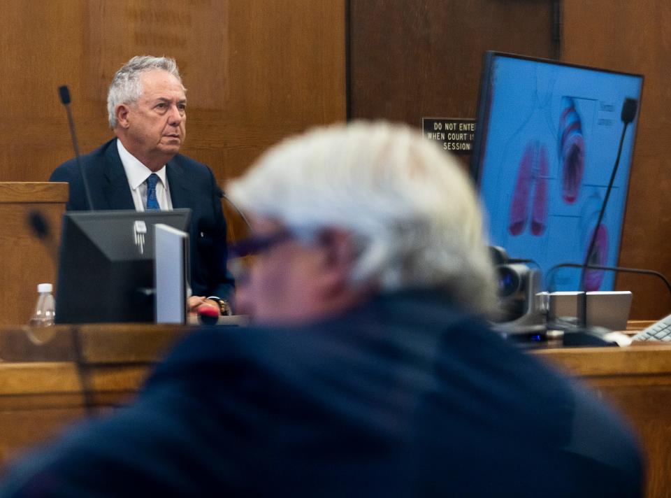 Michael Mattioli's attorney Michael F. Hart listens as Dr. James Pearle, a pulmonology expert witness, testifies during day four of Mattioli's trial Thursday, Nov. 9, 2023.