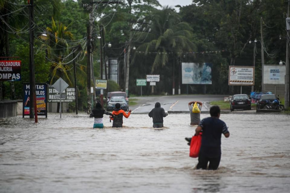 <div class="inline-image__caption"><p>Las Posas village 150 miles north of Guatemala City was severely flooded by Eta.</p></div> <div class="inline-image__credit">JOHAN ORDONEZ/Getty</div>