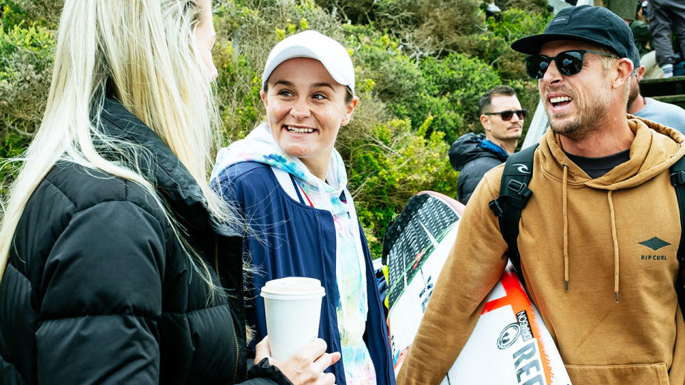 Ash Barty, pictured here chatting with Mick Fanning and Steph Gilmore at the Rip Curl Pro.