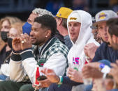 <p>Years after their hit "Somebody to Love," Usher and Bieber confirmed they're still pals by hitting the game side-by-side.</p>