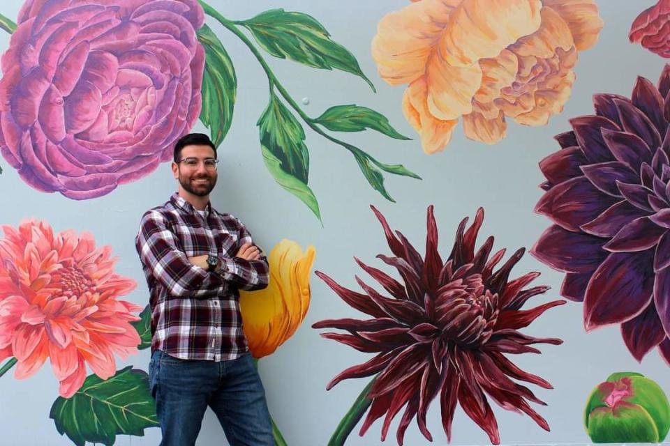 Sam Rimi, an art teacher at Lake Orion High School and Art Club adviser, received artwork from 12th grader Abby Maisel and asked permission to share it with the world. He is seen here at Summer Dreams Farm in Oxford on Oct. 5, 2021.