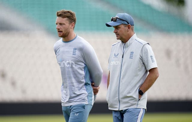 Matthew Mott, right, and Jos Buttler led England to the semi-finals of the T20 World Cup (Andrew Matthews/PA)