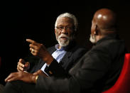 Basketball Hall of Famer Bill Russell, left, speaks to moderator Harry Edwards in the "Sports and Race: Leveling the Playing Field" panel during the Civil Rights Summit on Wednesday, April 9, 2014, in Austin, Texas. Russell discussed using his platform in basketball to raise awareness for civil rights. (AP Photo/Jack Plunkett)