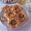 <p>These pretty filo baskets make a great vegetarian canapé or starter.<br> <br><strong>Vegetarian Christmas recipe:</strong> <strong><a href="https://www.goodhousekeeping.com/uk/food/recipes/a536495/spinach-and-ricotta-filo-baskets/" rel="nofollow noopener" target="_blank" data-ylk="slk:Spinach and ricotta filo baskets" class="link ">Spinach and ricotta filo baskets</a></strong></p>