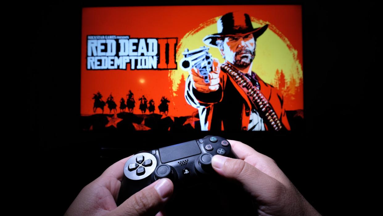 New York, USA - October 26, 2018: Red Dead Redemption 2 is a Western-themed action-adventure video game developed and published by Rockstar Games.