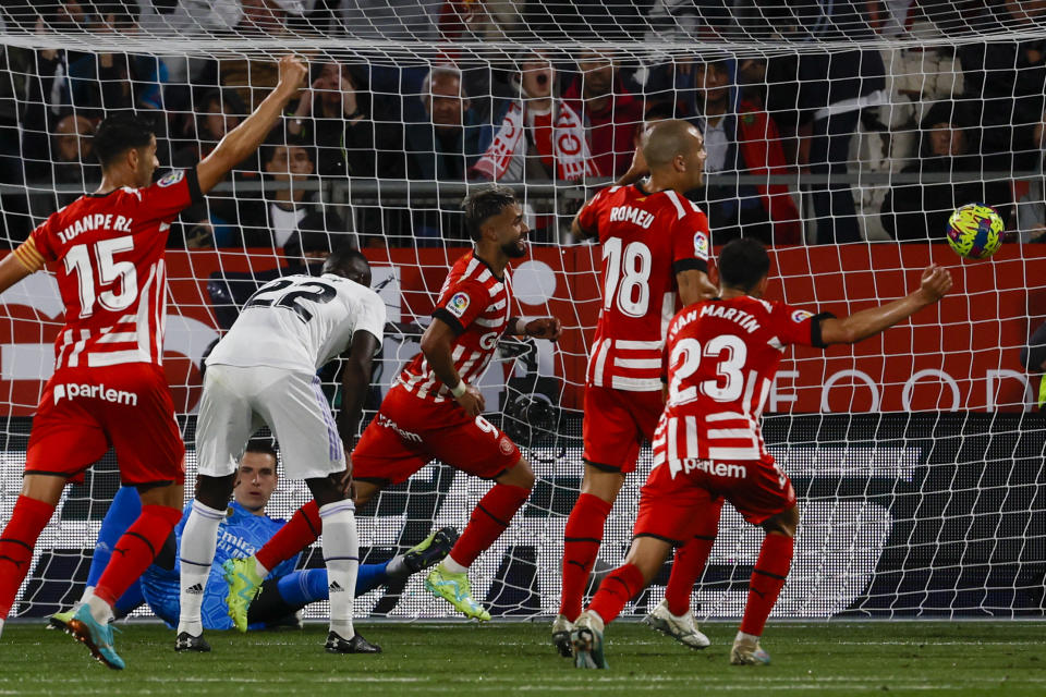 Girona's Taty Castellanos, center, celebrates after scoring his side's fourth goal during a Spanish La Liga soccer match between Girona and Real Madrid, at the Montilivi stadium in Girona, Spain, Tuesday, April 25, 2023. (AP Photo/Joan Monfort)