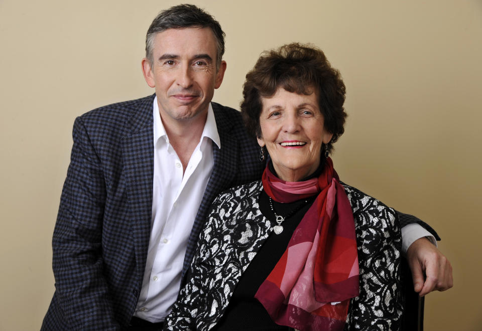 In this Wednesday, Nov. 13, 2013 photo, Philomena Lee, right, poses for a portrait with Steve Coogan, a cast member in the film "Philomena," at the Four Seasons Hotel in Beverly Hills, Calif. Lee was an unwed, pregnant teenager in 1952 when her Irish Catholic family sent her to a convent in shame. After three years, the boy was sold for adoption to the United States, and Lee spent the next five decades looking for him. Coogan optioned Sixsmith’s 2009 book, “The Lost Child of Philomena Lee,” without even reading it, determined to bring the story to the screen. (Photo by Chris Pizzello/Invision/AP)