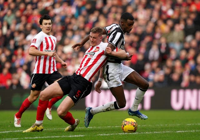 Daniel Ballard, left, and Newcastle's Alexander Isak battle for the ball 