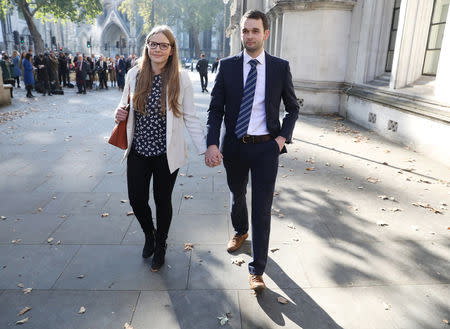 Daniel and Amy McArthur, who own Ashers Bakery in Belfast, leave the Supreme Court in London, Britain, October 10, 2018. REUTERS/Simon Dawson