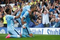 Football - Everton v Manchester City - Barclays Premier League - Goodison Park - 23/8/15 Aleksandar Kolarov celebrates with team mates after scoring the first goal for Manchester City Reuters / Andrew Yates