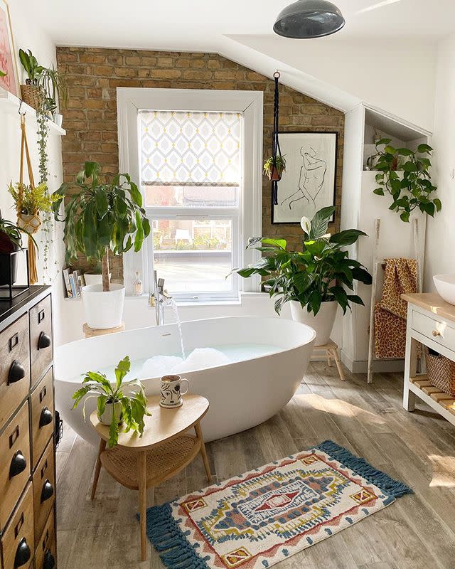 <p>As well as elevating your space, <a href="https://www.housebeautiful.com/uk/garden/plants/g33412479/bathroom-plants/" rel="nofollow noopener" target="_blank" data-ylk="slk:bathroom plants;elm:context_link;itc:0;sec:content-canvas" class="link ">bathroom plants</a> are great for helping to filter toxins out of the air. With hanging plants being tagged over 270k times on Instagram, it's no surprise that they made the list of trends to watch. </p><p>'Hanging plants can really add life and interest to an otherwise quite simple space,' says Sarah. 'However if you struggle to keep plants alive don't feel the pressure to have real plants – just fake it. It's far better to use faux plants than having a selection of dried up, half-dead plants in your bathroom.'<br></p><p><a href="https://www.instagram.com/p/CE2RK7vnTEF/" rel="nofollow noopener" target="_blank" data-ylk="slk:See the original post on Instagram;elm:context_link;itc:0;sec:content-canvas" class="link ">See the original post on Instagram</a></p>