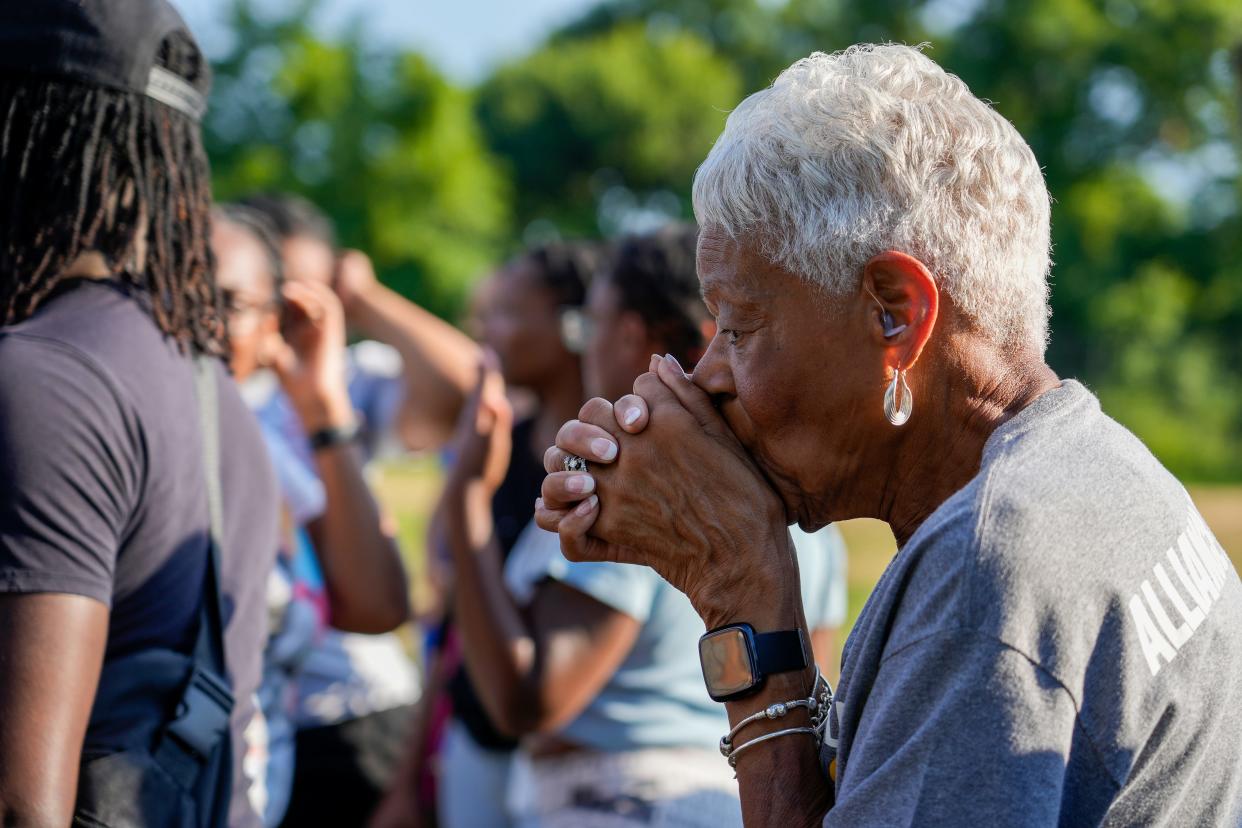 Joy Warfield attends a balloon release at Ryan Park in memory of 9-year-old Da’Myiah Barton-Pickens, who was shot and killed July 10 in her Silverton home. Warfield knew Pickens-Barton through Alliance Academy of Cincinnati.