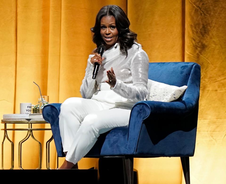 The former U.S. first lady speaks at the opening of her multi-city book tour at the United Center in Chicago, on Nov. 13.