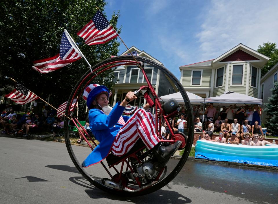 Dressed as Uncle Sam, Keith Dufrane of Grandview rides his monowheel along 2nd Avenue during the Doo Dah Parade on Monday. The parade is steeped in satire and is a Columbus Independence Day tradition.