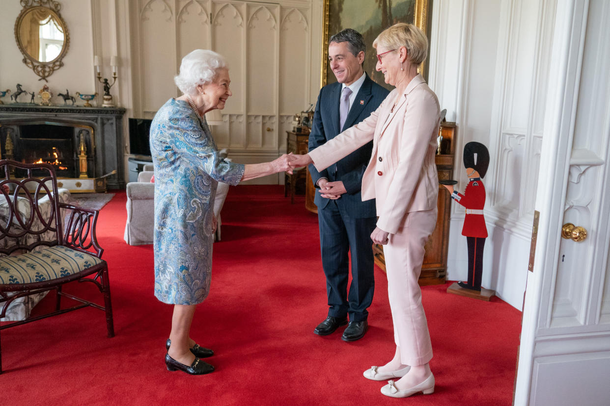 WINDSOR, ENGLAND - APRIL 28: Queen Elizabeth II receives the President of Switzerland Ignazio Cassis and his wife Paola Cassis during an audience at Windsor Castle on April 28, 2022 in Windsor, England. (Photo by Dominic Lipinski - WPA Pool/Getty Images)